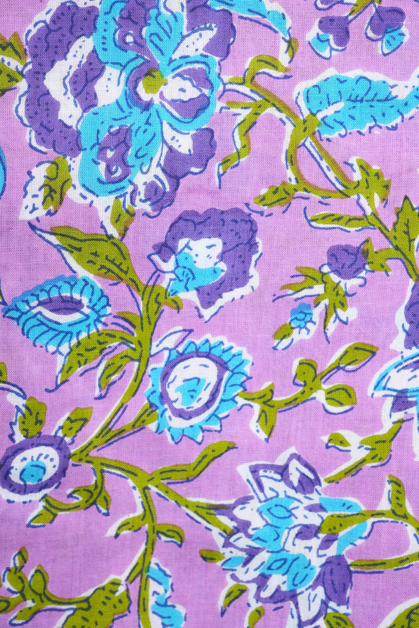 Cooling pajama bottoms in lavender cotton with blue flower print, elastic waist, and roomy pockets — perfect for hot sleepers or cotton anniversary gift ideas.