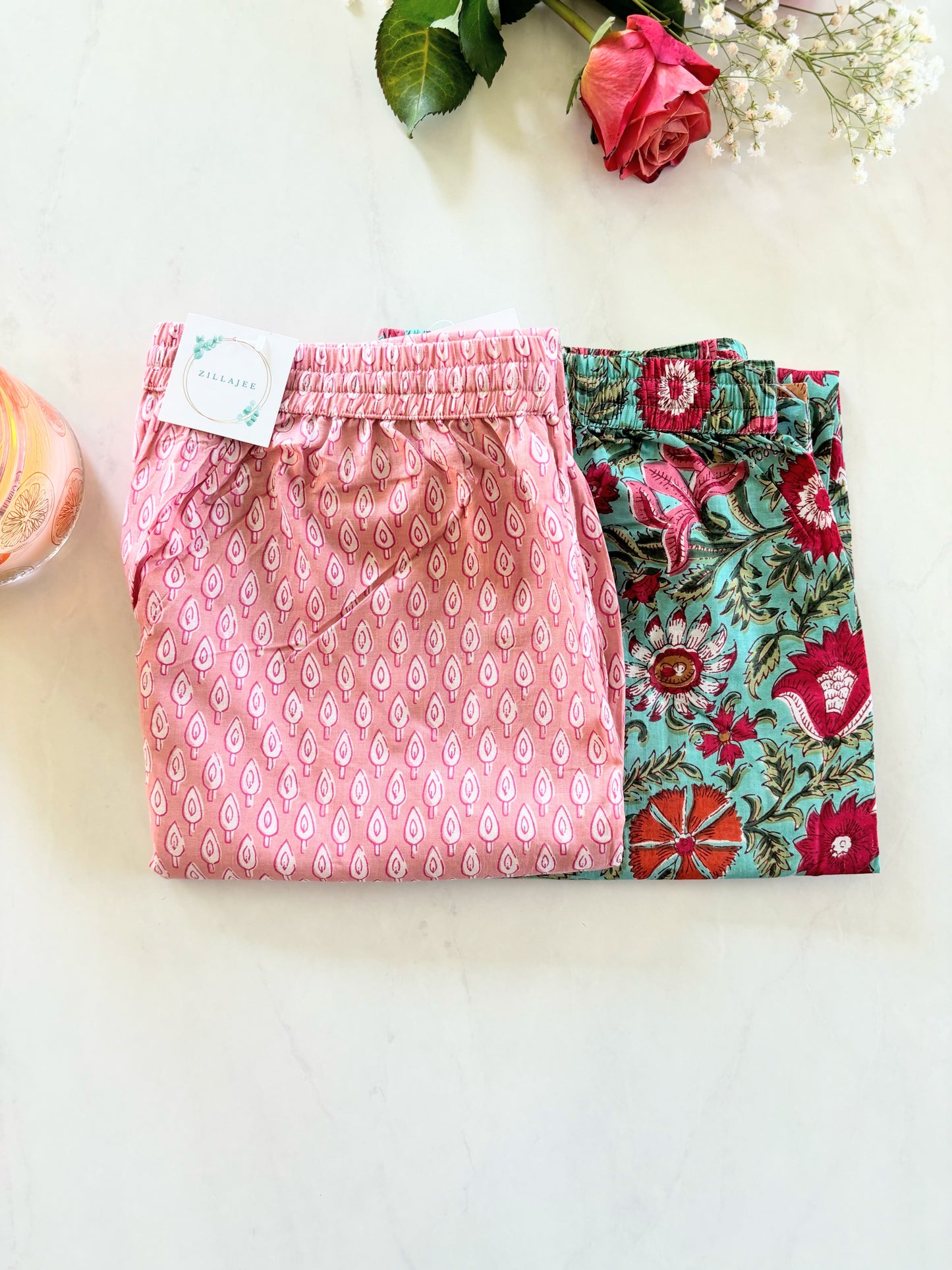 Multipack of cotton lounge pants with a vibrant pink floral pattern, made with breathable fabric for ultimate comfort—ideal for a spring gift guide.