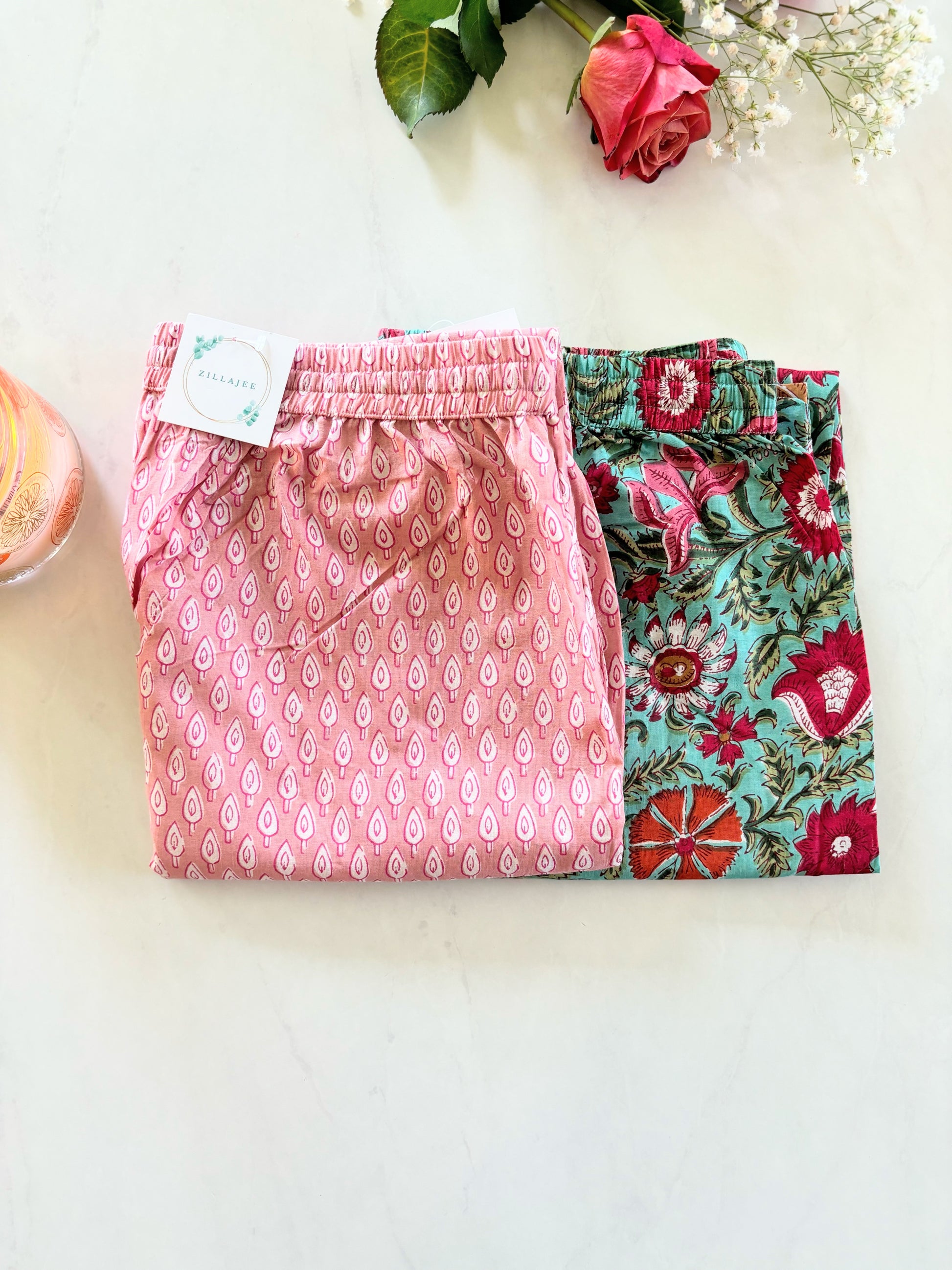 Multipack of cotton lounge pants with a vibrant pink floral pattern, made with breathable fabric for ultimate comfort—ideal for a spring gift guide.