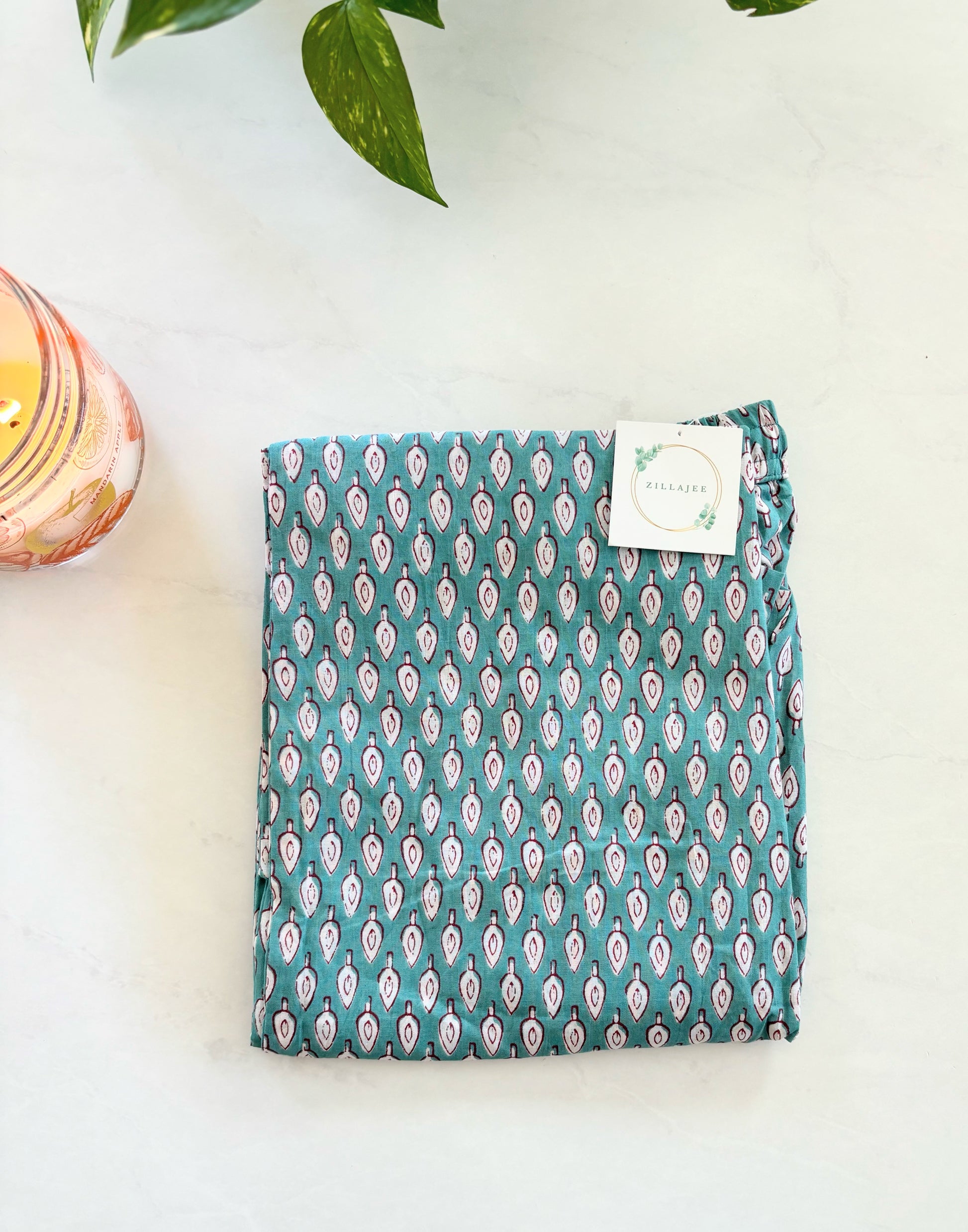 Women’s cotton pajama pants with a festive fir tree print in dark red on green. Soft, comfy, and cooling—ideal for cozy Christmas mornings or as a thoughtful holiday gift.