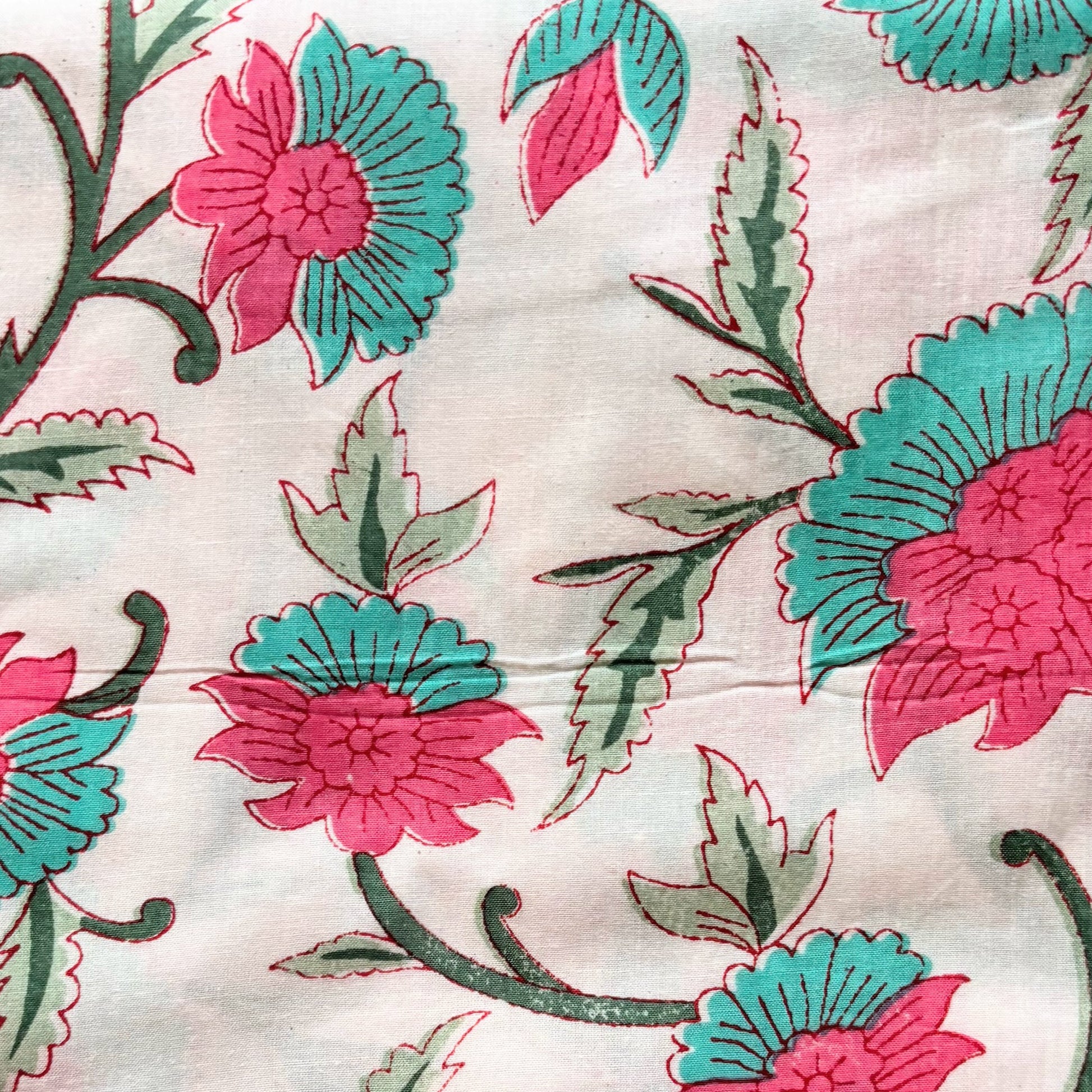 Boho chic floral sleep trousers in a soft cotton fabric with an adjustable drawstring waistband and pockets, perfect for lounging or sleep.