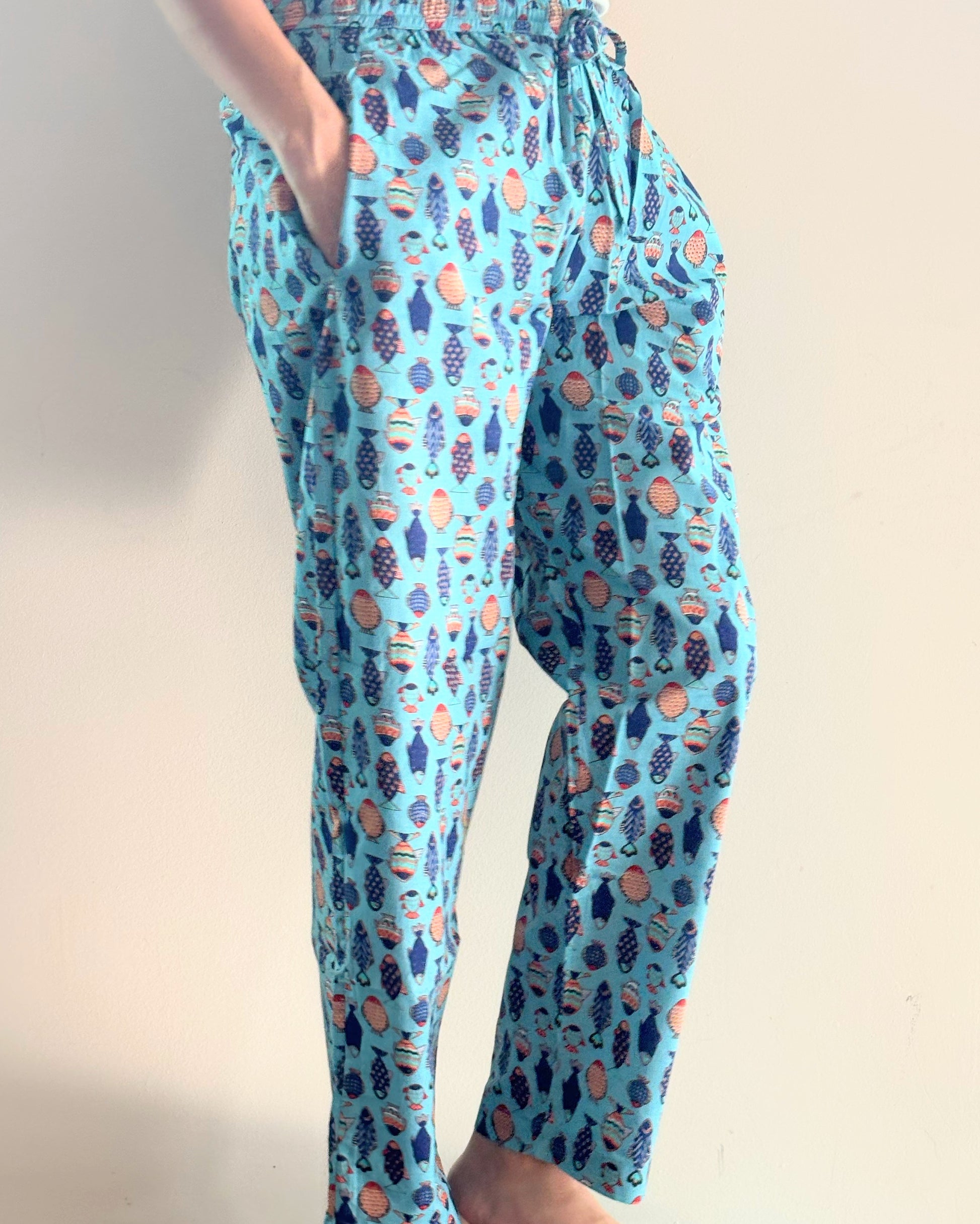 Women's cotton pajama pants with Marine Melodies print on white background