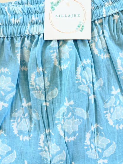 Vibrant cotton sleep pants with an elastic waistband and drawstring, featuring a feminine floral print, offering comfort and style for lounging or sleep.