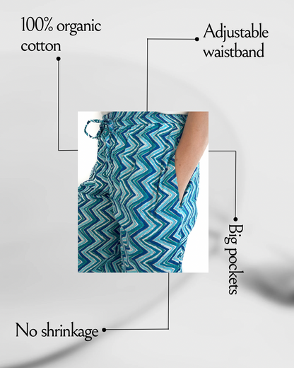 SEO Description: Elevate your sleepwear collection with our Blue Wave Serenity Cotton Pajama Pants for Women. Made from soft and breathable cotton fabric, these pajama pants feature a calming blue wave design that adds a touch of style to your bedtime routine. Whether you're lounging at home or catching up on beauty sleep, these pants offer both comfort and tranquility. Get the perfect mix of relaxation and fashion with our Blue Wave Serenity Pajama Pants!