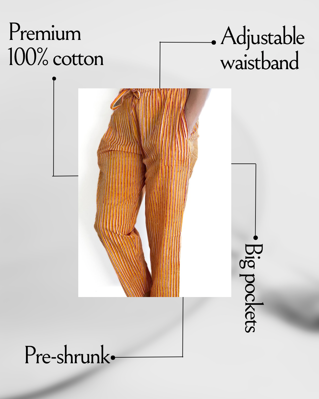 Stylish striped lounge pants for women in 100% cotton, with an elastic waistband, side pockets, and a yellow-red color scheme