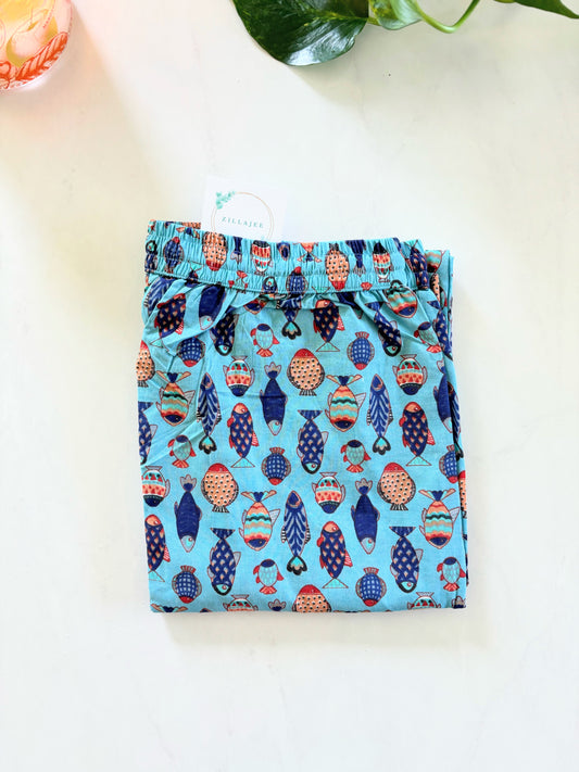 Women's cotton pajama pants with Marine Melodies print on white background