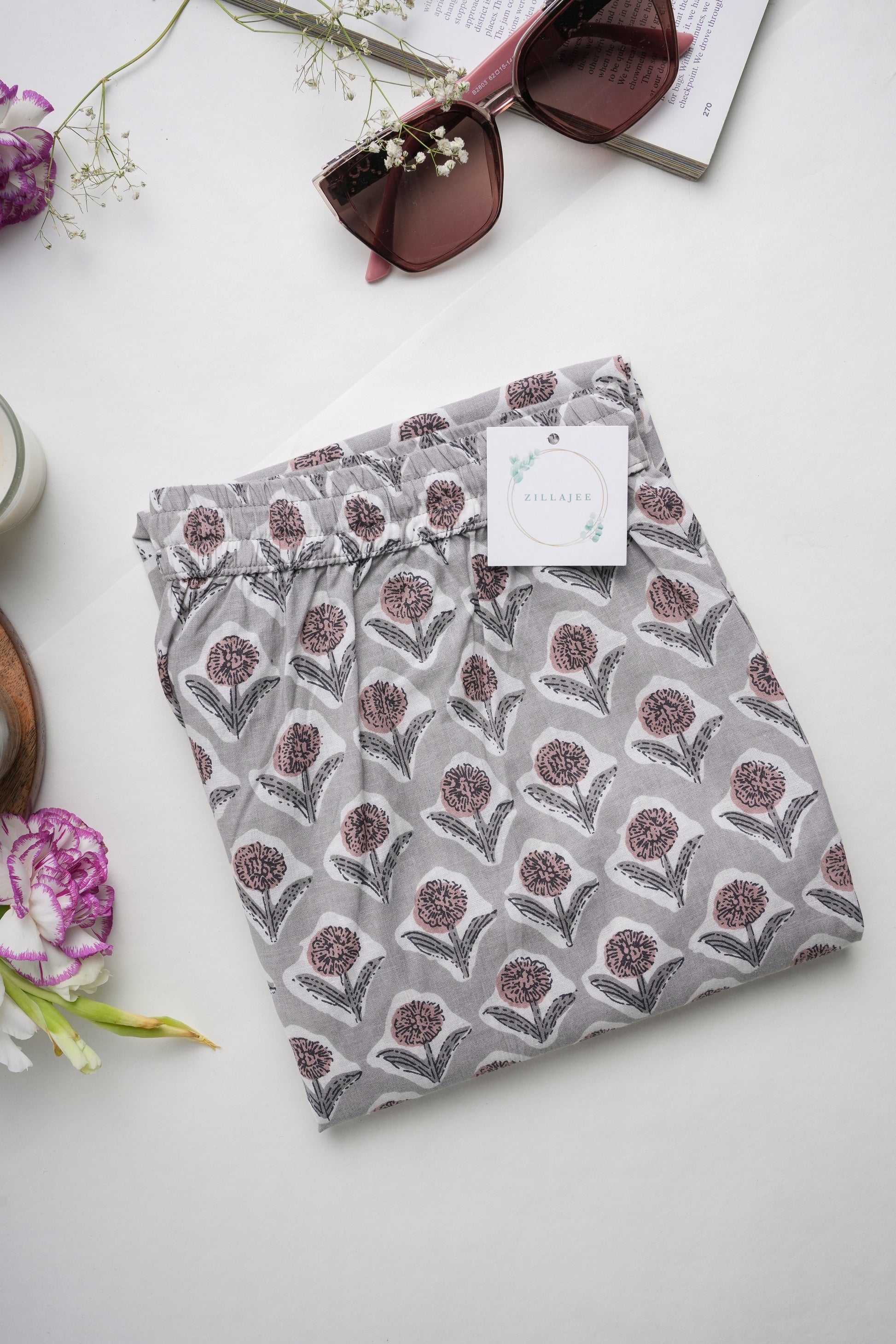 Women’s 100% cotton pj pants with soft elastic waistband, adjustable drawstring, and deep pockets, featuring a gray base with bold brown floral print — ideal as a bridesmaid proposal gift idea or everyday loungewear.
