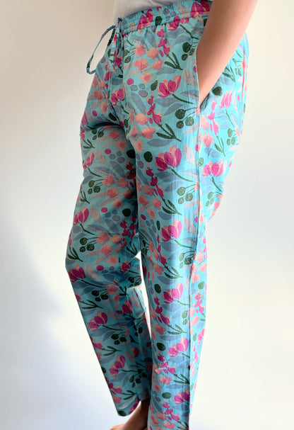 Lightweight and soft cotton sleep trousers in Tall sizes, featuring a vibrant pink floral print on blue, perfect for lounging or sleepwear.