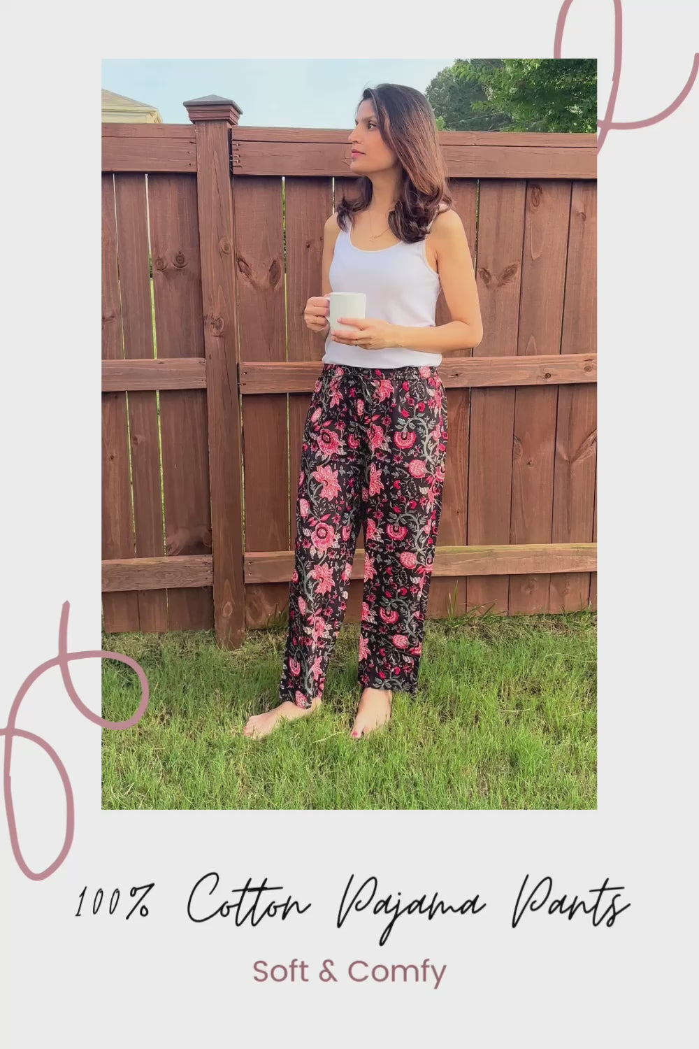 Comfortable ladies' pajama bottoms in a striking floral pattern of red and orange on black, crafted from lightweight, breathable cotton for ultimate comfort.