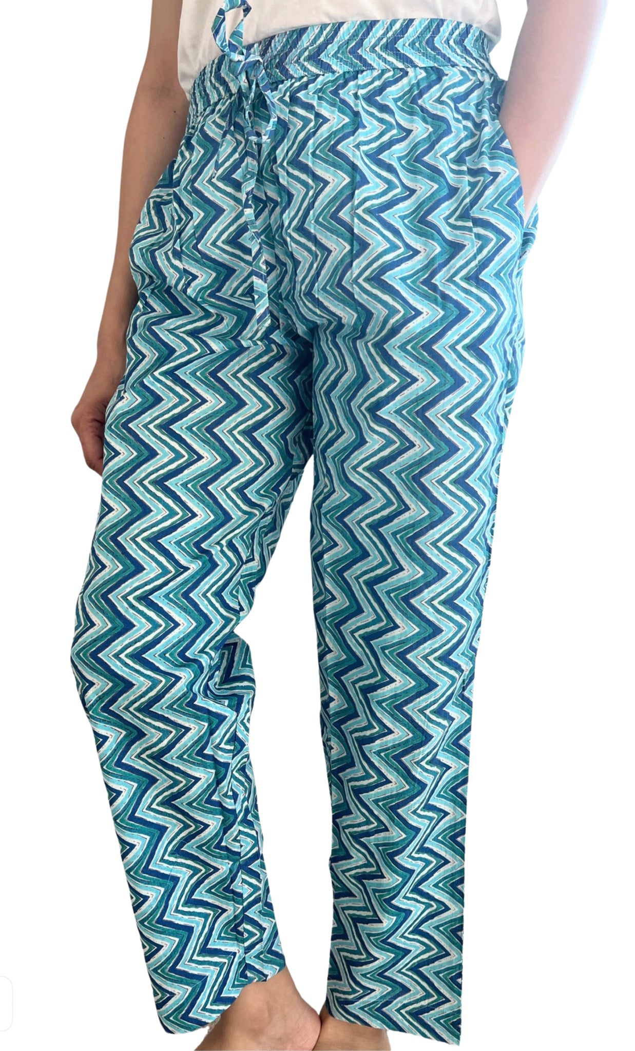SEO Description: Elevate your sleepwear collection with our Blue Wave Serenity Cotton Pajama Pants for Women. Made from soft and breathable cotton fabric, these pajama pants feature a calming blue wave design that adds a touch of style to your bedtime routine. Whether you're lounging at home or catching up on beauty sleep, these pants offer both comfort and tranquility. Get the perfect mix of relaxation and fashion with our Blue Wave Serenity Pajama Pants!