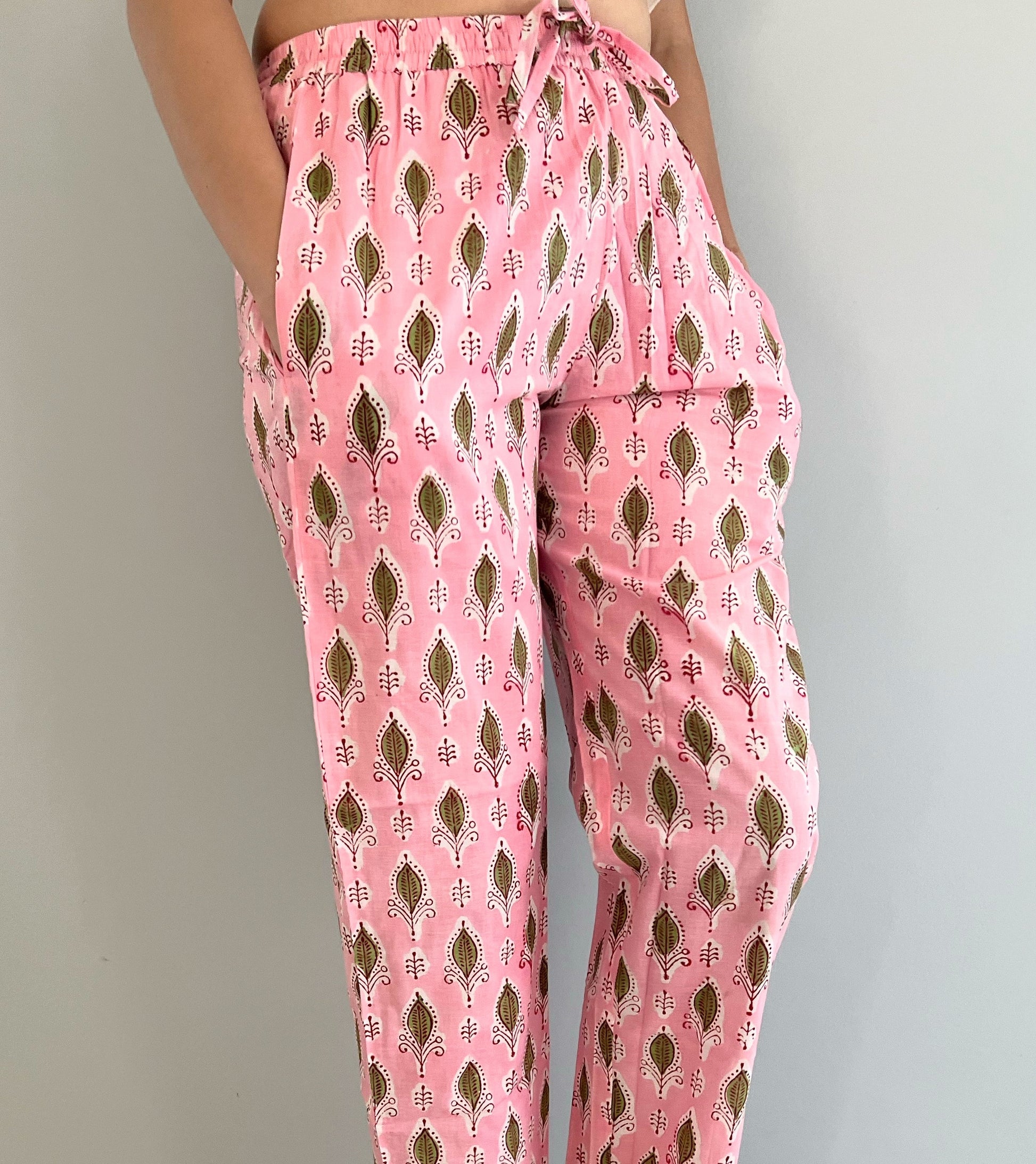 SEO Description: Shop these 100% cotton pajama pants for women featuring a rosy foliage design. Made with ethically sourced organic cotton and natural dyes, these comfy sleep pants come with an elastic waistband, drawstring, and deep pockets. Available in petite, short, tall, plus sizes. Ideal for new moms, girls' weekends, sleepovers, bridal showers, and bachelorettes. Enjoy FREE shipping and same-day dispatch from a small business in North Carolina, USA 🇺🇸.