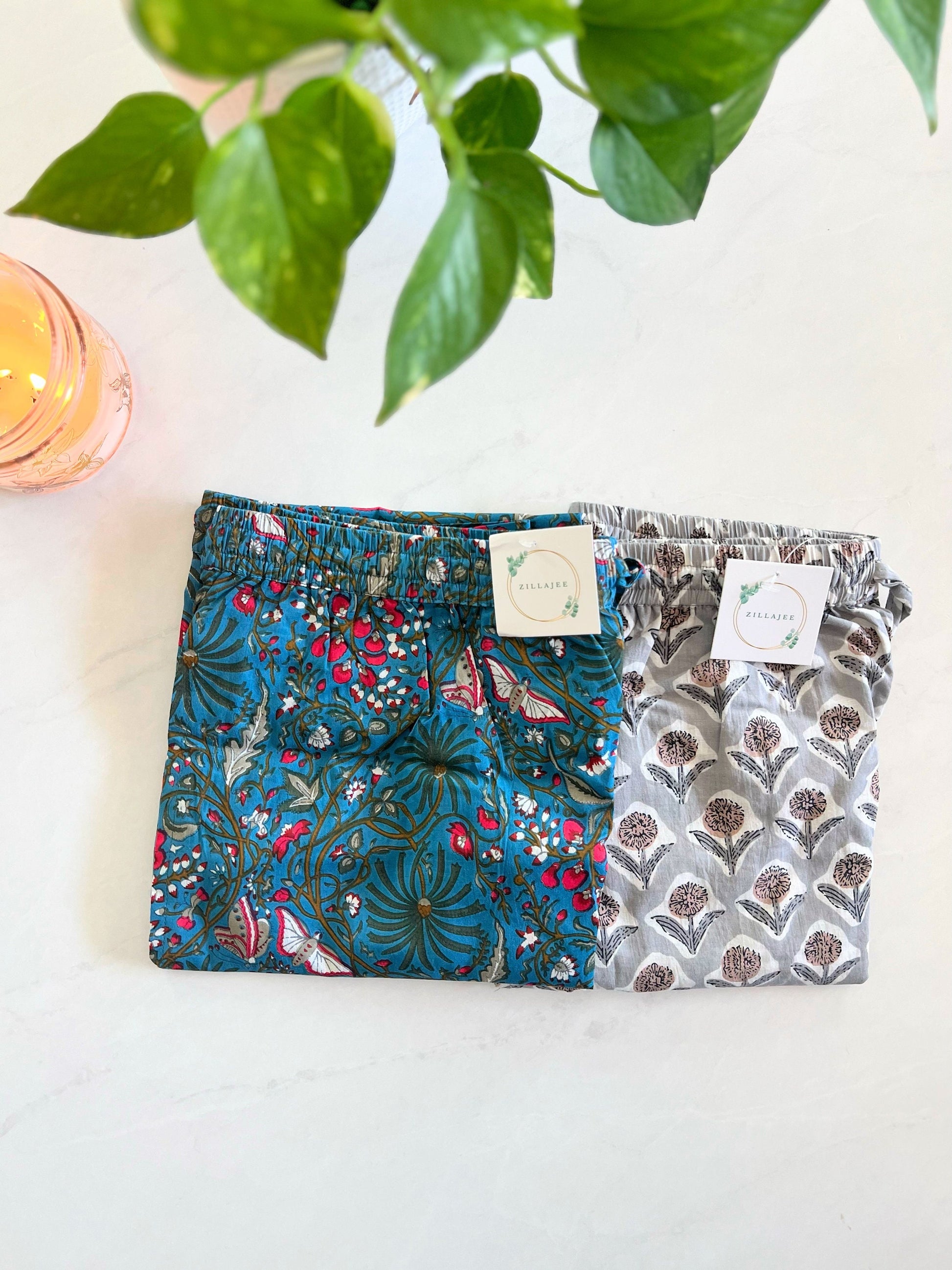 Multipack of 100% cotton lounge pants for women, featuring a relaxed fit, elastic waistband, and drawstring, designed with beautiful floral patterns for ultimate comfort.